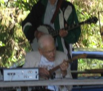 Founder Ethan B Shelton playing music at 106th birthday party